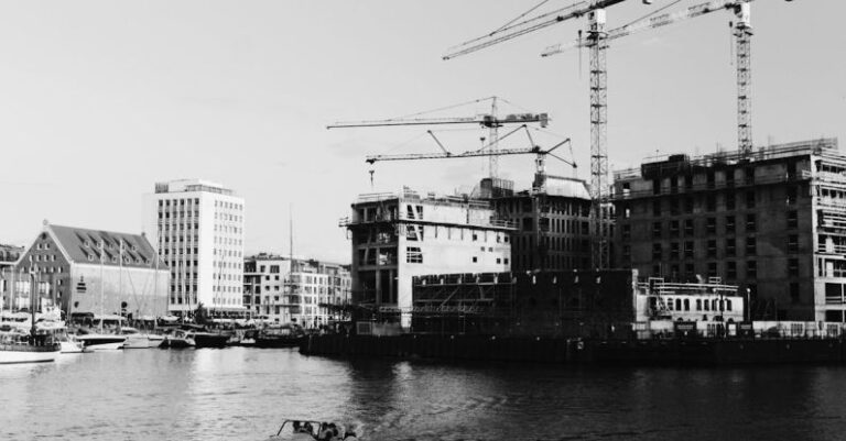 Floating City - Grayscale Photo of Buildings