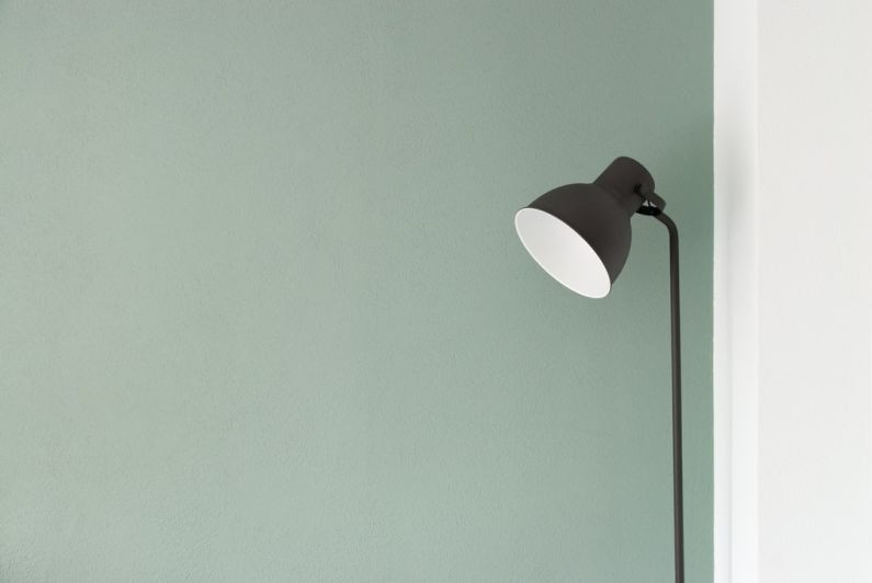 Great Green Wall - black floor lamp at the corner