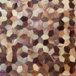 Sustainable Materials - a close up of a rug made of wood