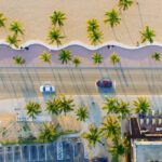 IoT Urban - an aerial view of a beach with palm trees
